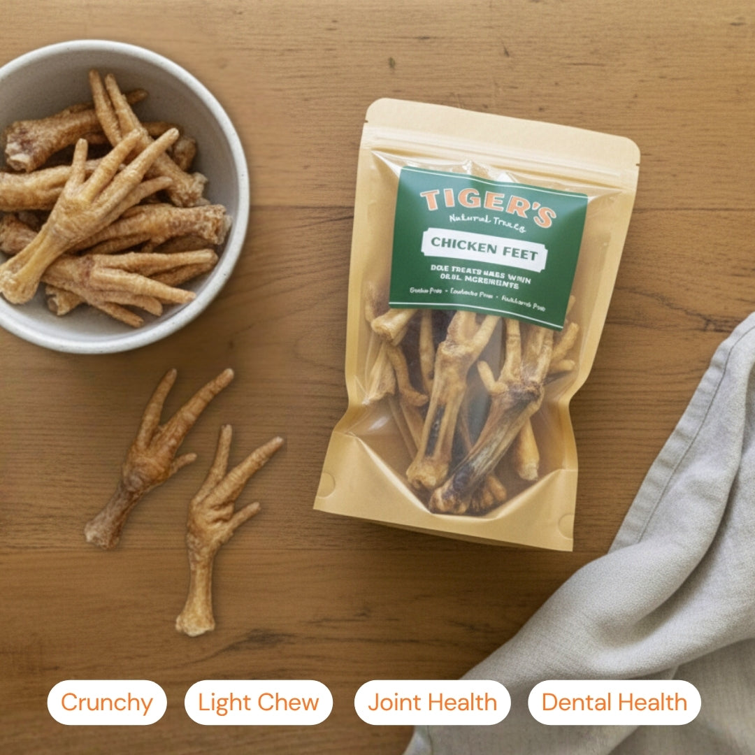 Tiger's Natural Treats chicken feet packaging with a bowl of chicken feet on a wooden surface.